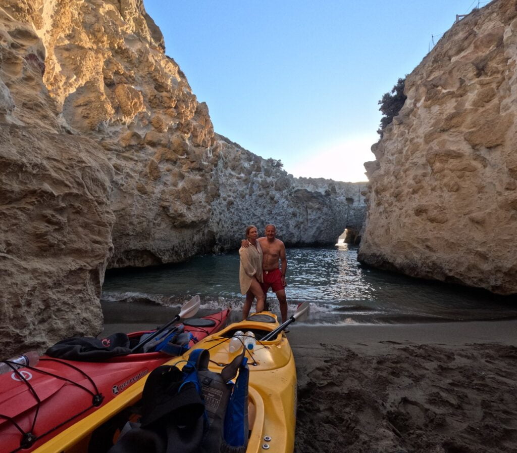 hugging in sunset kayaking papafragas milos greece